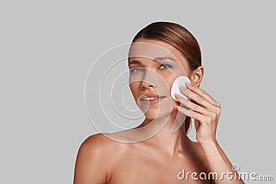 Taking good care of her skin. Stock Photo