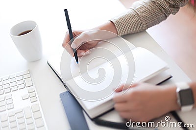 Taking notes Stock Photo