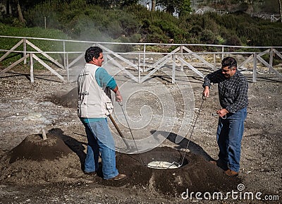 Taking out Furnas stew Editorial Stock Photo