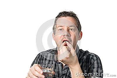 Taking painkiller Stock Photo