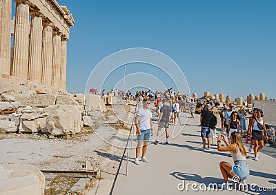 Taking photos in front of the Parthenon, in Athens Editorial Stock Photo