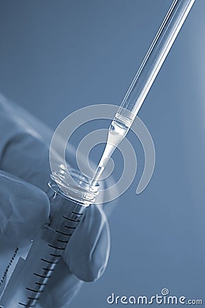 Taking a sample with a pipette Stock Photo