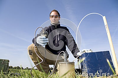 Taking samples of the soil and groundwater. Stock Photo