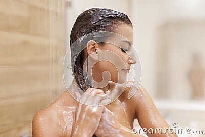 Taking shower Stock Photo