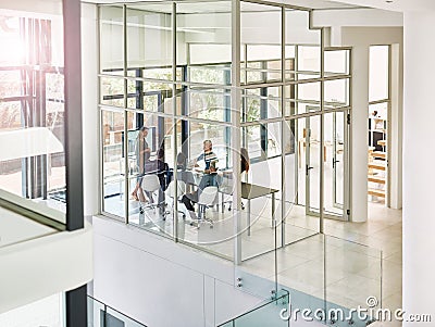 Taking stock and setting new targets. a corporate businessperson giving a presentation in the boardroom. Stock Photo