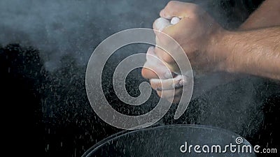 Talc sports. Closeup of a muscular man ready to workout. male powerlifter hand in talc and sports wristbands preparing Stock Photo