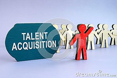 Talent acquisition written on dark plate and wooden figurines. Stock Photo