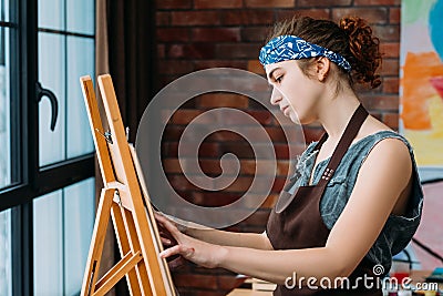 Talent skills creative artist easel painting Stock Photo