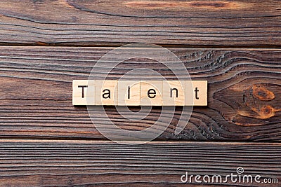 Talent word written on wood block. Talent text on cement table for your desing, concept Stock Photo