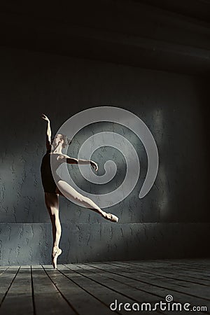 Talented ballet dancer standing on the tiptoe in the studio Stock Photo