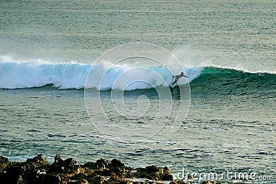Talented surfer on the big waves of the Pacific Ocean at Hanga Roa, Easter Island, Chile Stock Photo