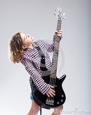 Talented young girl with a gift for guitar music Stock Photo