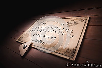 Talking board and planchette Stock Photo