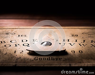 Talking board and planchette Stock Photo