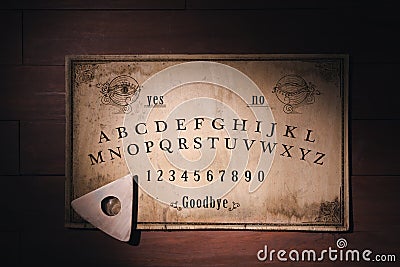 Talking board and planchette Stock Photo