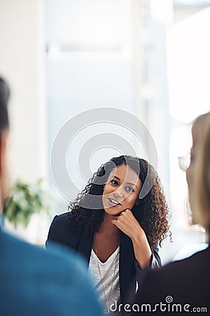 Talking psychologist counseling a couple in routine marriage therapy in a clinic. Curious, confident and young mental Stock Photo