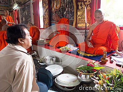 Talking with Thai monk in temple Editorial Stock Photo