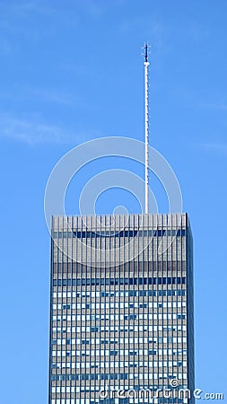 Tall antenna on skyscraper Stock Photo