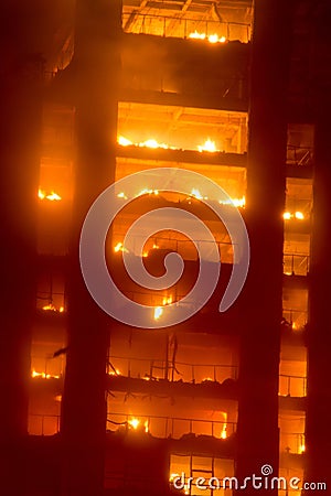 Tall building on fire / big fires burnning Stock Photo