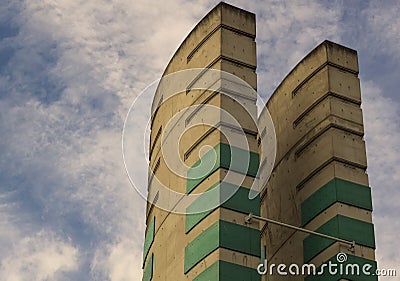 Tall concrete pipes releasing exhaust air Stock Photo