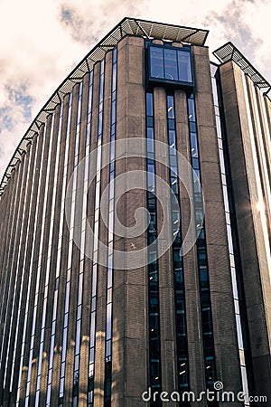 Tall imposing concrete office block in the city Stock Photo