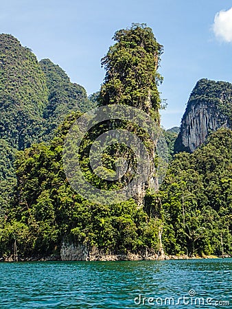 Tall limestone cliffs at Khao Sok lake Stock Photo