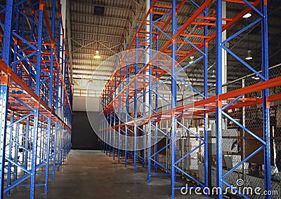 Tall Shelves in Storage Warehouse. Stock Photo