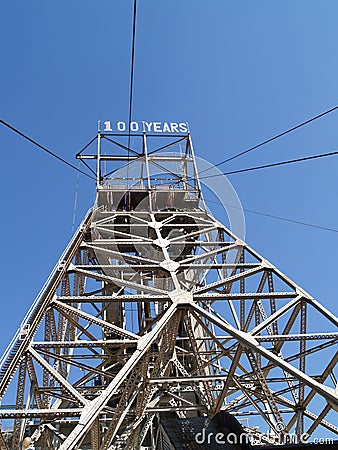 Tall steel pylon against blue sky Stock Photo