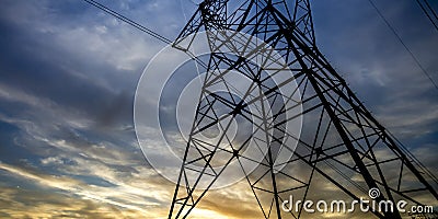 A tall steel tower supporting electrical wires Stock Photo