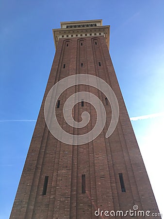 Tall tower made of brick in Barcelona. Stock Photo