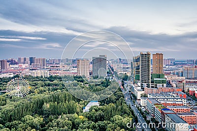 Tall view of ferris wheel in qingcheng park, Hohhot, Inner Mongolia, China Editorial Stock Photo