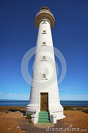Tall White Lighthouse Stock Photo