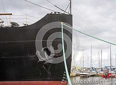 Tallinn, Estonia, August 2018. Ship`s nose, metal anchor and cable for mooring vessels close-up. Editorial Stock Photo
