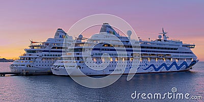 Tallinn, Estonia -march 05, 2022: AIDA Cruise ship at sunset time in harbour. AIDA luxury liner at wonderful evening Editorial Stock Photo