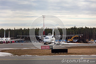 Tallinn, Estonia - March 23, 2021: finnair plane ATR 72-500 OH-ATE takes off from Airport of Tallinn Editorial Stock Photo