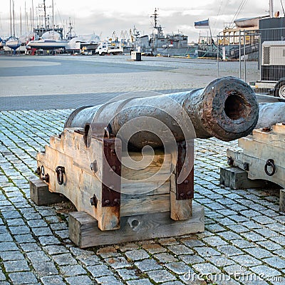 Tallinn, Estonia - November 18, 2018: Old cannons in the Maritime Museum of Tallinn. Cannon on wooden gun carriages Editorial Stock Photo
