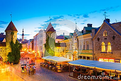 Tallinn, Estonia. People Walking Near Famous Landmark Viru Gate Stock Photo