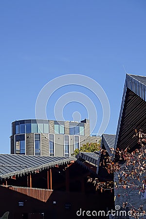 Tallinn, Estonia - September 26, 2021: View to interesting unusual shape diagonal roof and facade of the grey building Editorial Stock Photo