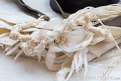 Tallit in close up - tzitzit Stock Photo