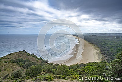 Tallow Beach and Arakwal National Park view from Cape Byron Lighthouse During Dramatic Weather, Byron Bay, NSW Australia. Stock Photo