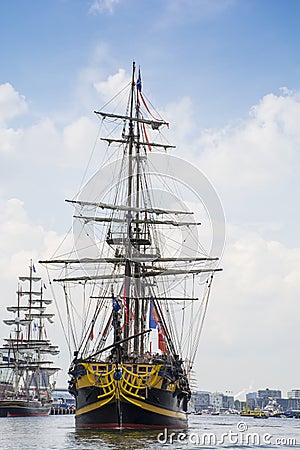 Tallship Etoile-du-Roy (France) is sailing at 'het IJ' on his way to the shore. Editorial Stock Photo