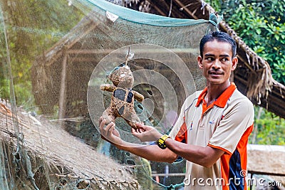 TAMAN NEGARA, MALAYSIA - MARCH 17, 2018: Teddy bear, target for a blowpipe in an indigenous village in Taman Negara Editorial Stock Photo