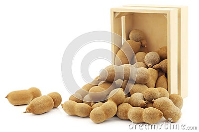 Tamarind beans in a wooden box Stock Photo