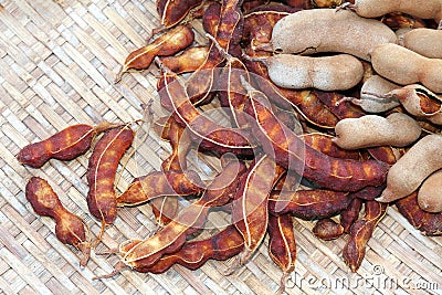 Tamarind peel and tamarind, organic tamarind nature, tamarind heap Stock Photo