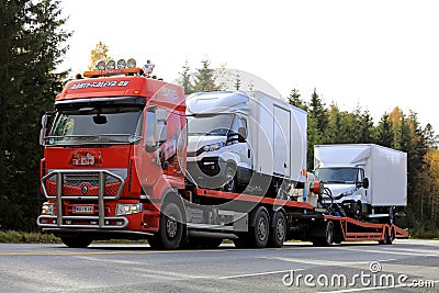 Renault Premium Transports Light Trucks along Road Editorial Stock Photo