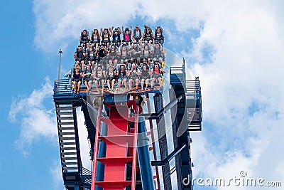 Excited faces of people enyoing a Sheikra rollercoaster ride at Busch Gardens Theme Park 9 Editorial Stock Photo