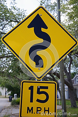 15 Miles Per Hour & squiggly street sign Editorial Stock Photo
