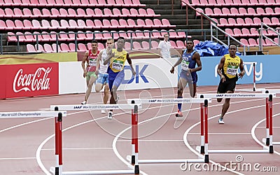 Athlets running 400 metrs hurdles heats on the IAAF World U20 Championship in Tampere, Finland 12 July Editorial Stock Photo