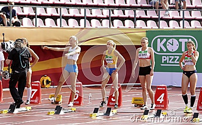 TAMPERE, FINLAND, July 12: SANNI PAJASMAA FIN, Alina Shukh Ukraine, ANDREA OBETZHOFER AUT, JANA NOVOTNA CZE on the start Editorial Stock Photo