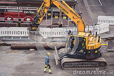 Tampere tramline construction- Doosan excavator digging Editorial Stock Photo